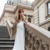 Fit & Flare Brautkleid von hinten – figurbetonter Schnitt mit feiner Spitzenrückansicht